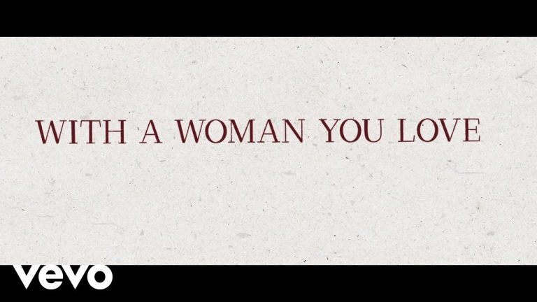 Justin Moore – With A Woman You Love (Lyric Video)
